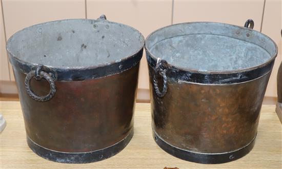 A pair of copper and iron coal buckets